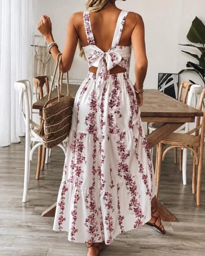 Summery Floral Maxi Dress Featuring A Chic Back Cutout With A Tie Bow Detail