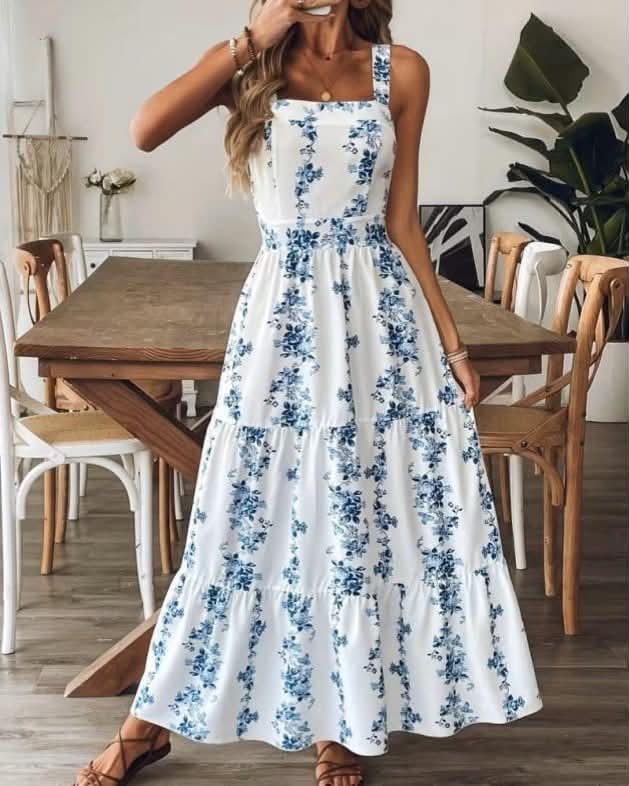 Summery Floral Maxi Dress Featuring A Chic Back Cutout With A Tie Bow Detail