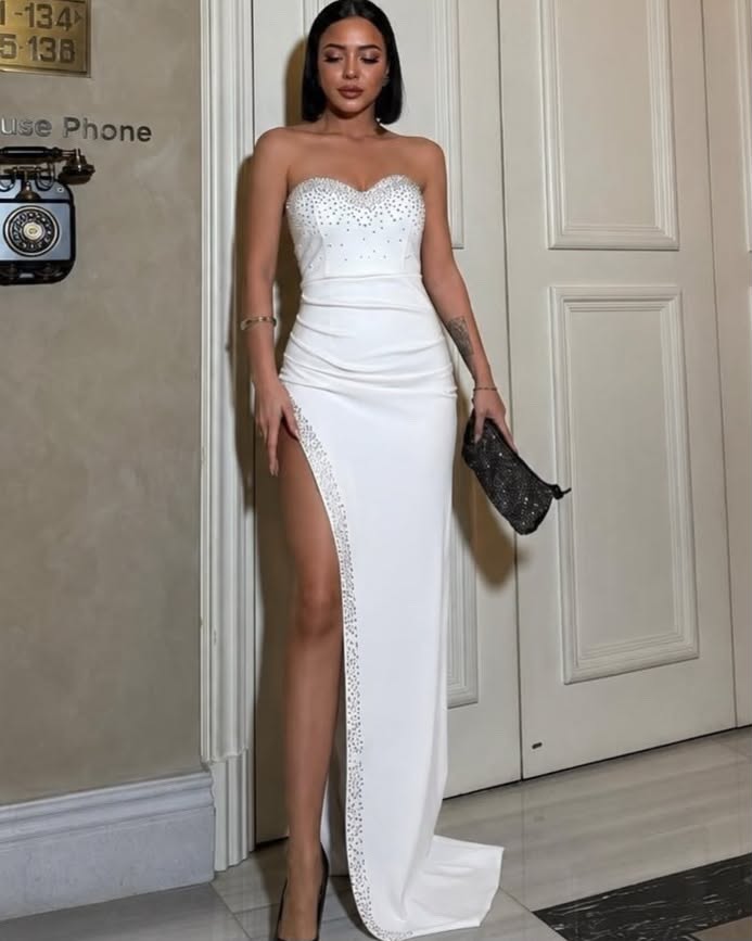 Elegant Strapless Gown With A Sparkling Embellished Slit