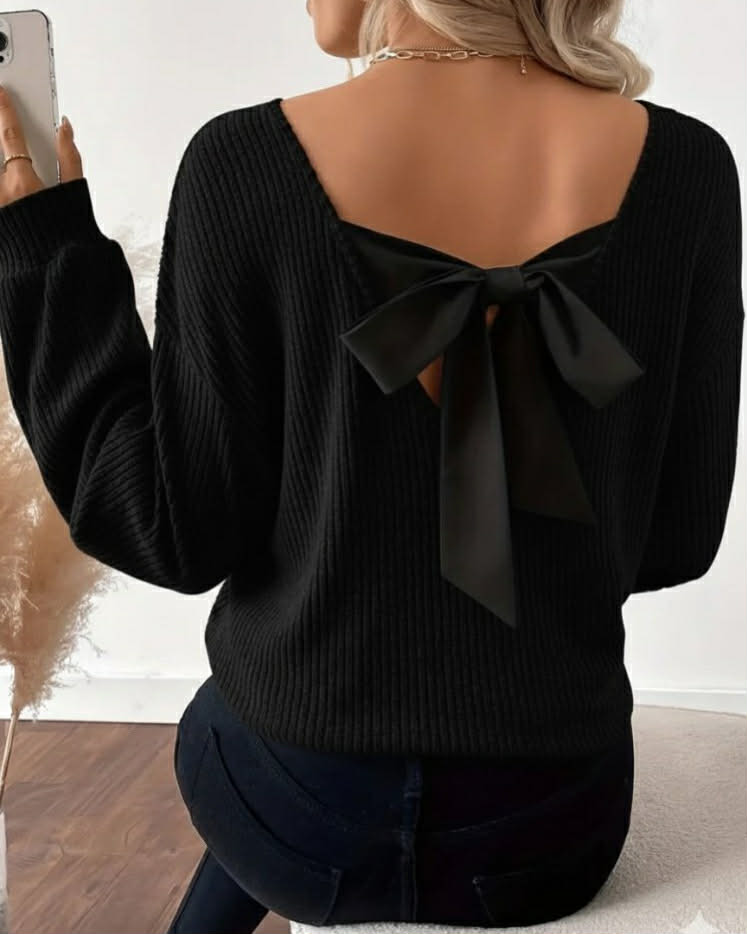 Elegant White Top With A Bow On The Back
